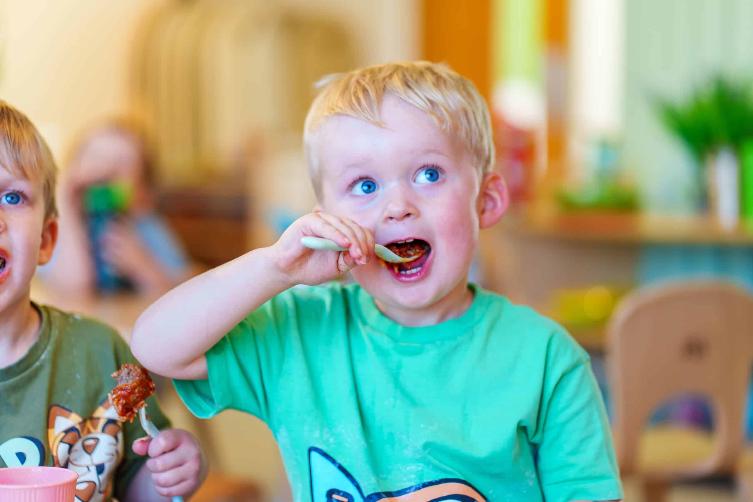 Children eating meatballs 2
